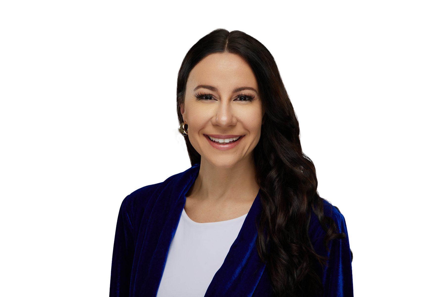 Headshot of Bryanna Baptiste in a royal blue velvet blazer